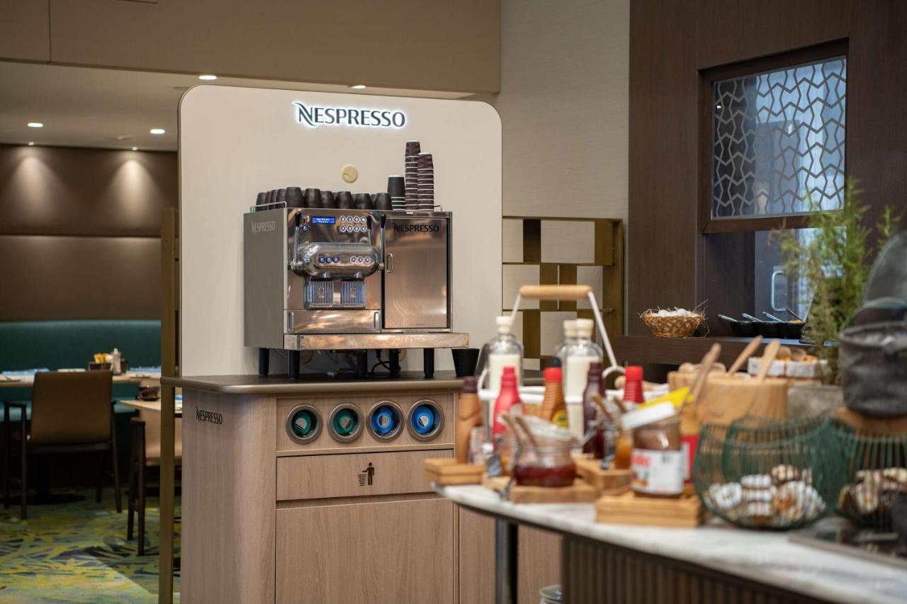Radisson Blu Hotel, Jeddah Corniche Экстерьер фото A Nespresso machine